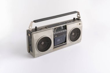 a abstract retro simple radio cassette recorder isolated on color background, simple music listen on the party
