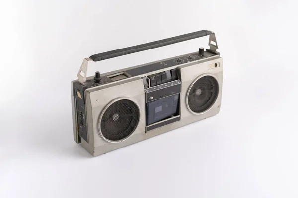 A abstract retro simple radio cassette recorder isolated on color background, simple music listen on the party — Stock Fotó