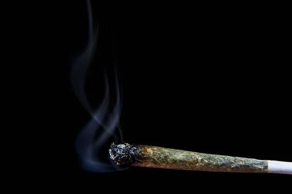 Marijuana joint with smoke — Stock Photo, Image