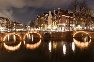 Beautiful Amsterdam night scene clipart