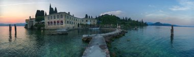 Punta San Vigilo at Lake Garda, Italy clipart