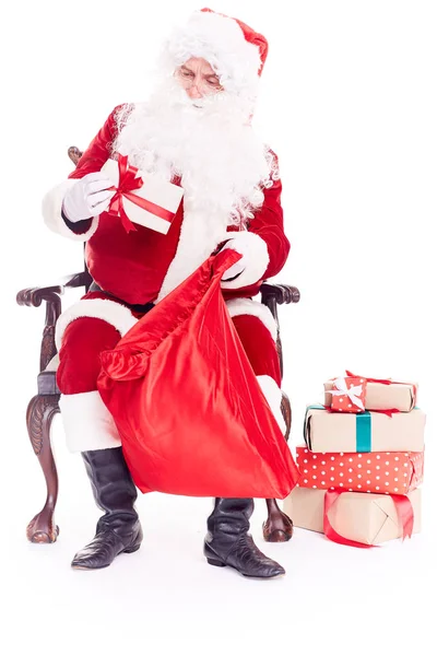 Santa Claus zijn zak verpakking — Stockfoto