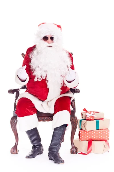 Swaggy Santa relaxing in chair — Stock Photo, Image