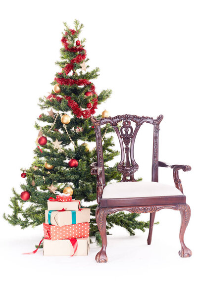Chair near Christmas tree
