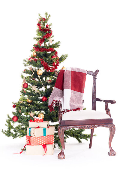 Chair near Christmas tree