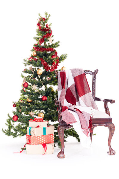 Chair near Christmas tree