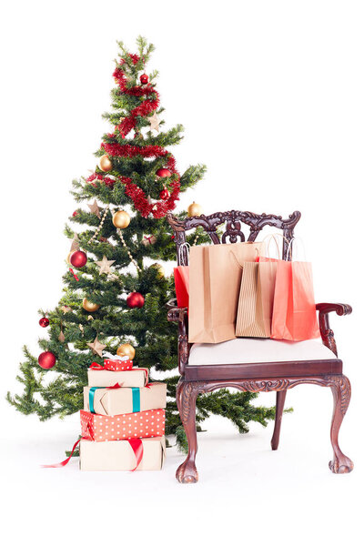 Chair near Christmas tree