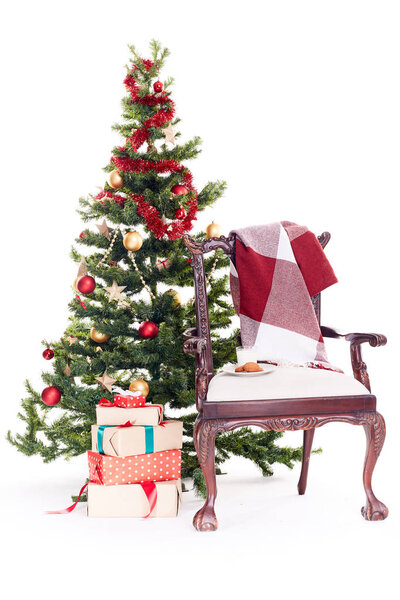 Chair near Christmas tree