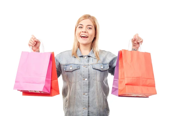 Frau mit Einkaufstüten — Stockfoto