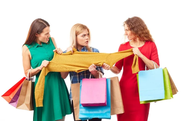 Fighting over piece of clothing — Stock Photo, Image