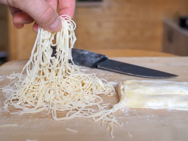 Hand-sliced noodles for the dough soup. For chicken noodle soup.