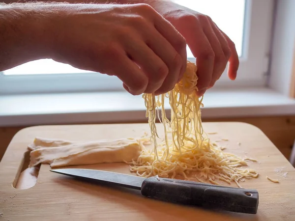 Hand-sliced noodles for the dough soup. For chicken noodle soup.