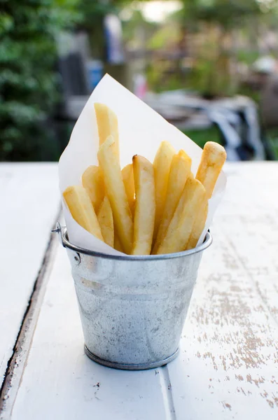 French fries in steel bucket — Stock Photo, Image