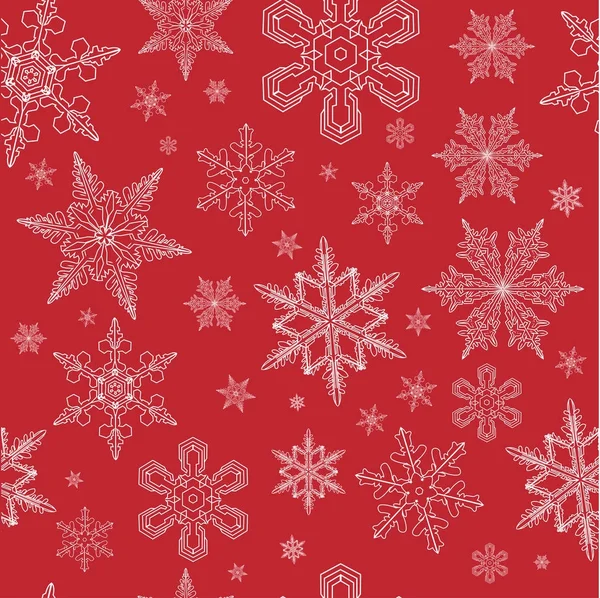 Snöflingor mönster i rött — Stock vektor