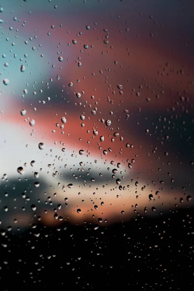 Raindrops and colored sky — Stock Photo, Image