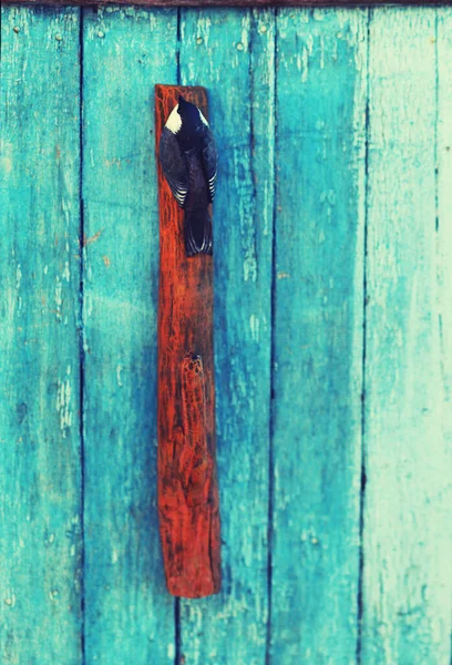wooden handmade hanger with wooden figure of bird tit,handmade home decoration in scandinavian style