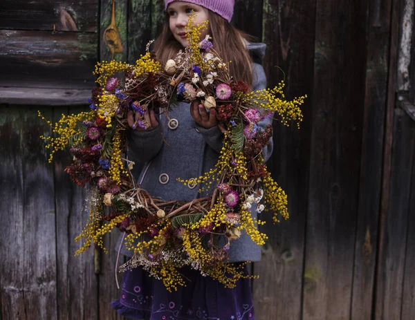 girl with spring wreath /mother\'s day,march 8 concept