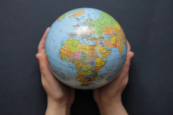 globe in human hands. Earth saving concept