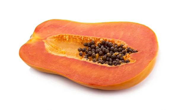 Viipaloitu kypsä papaija siemenillä taustalla. — kuvapankkivalokuva
