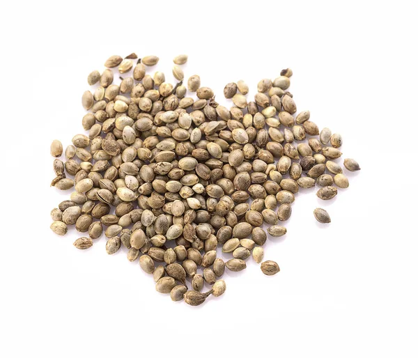 Heap de sementes de cânhamo no fundo branco — Fotografia de Stock