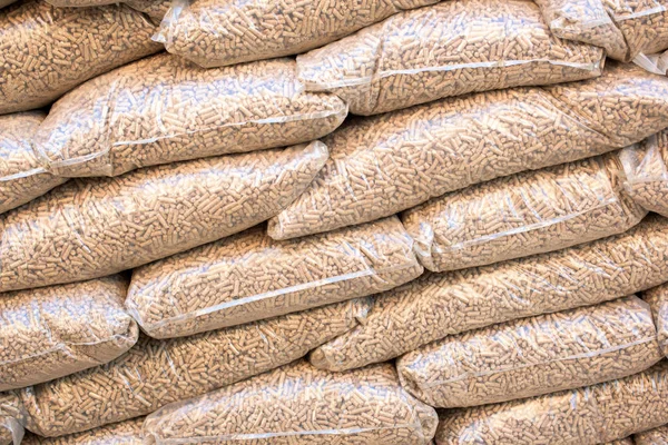Wooden pellets in sacks — Stock Photo, Image