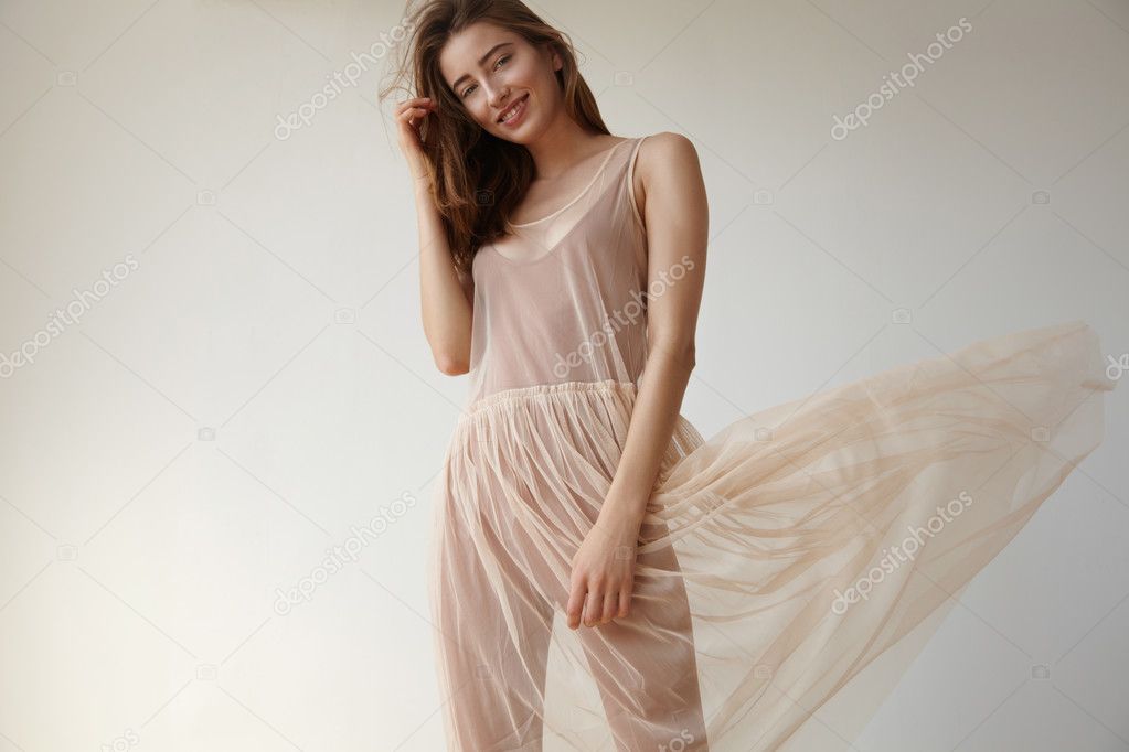 Woman in transparent dress Stock Photo by ©kazzakova 128182318