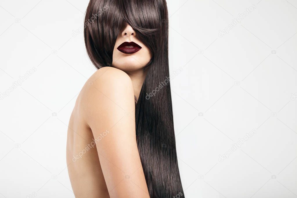 woman with hair covering her face
