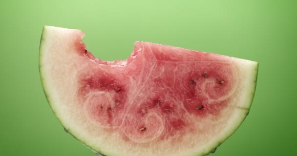 Invisible being person eats a water-melon slice — Stock Video