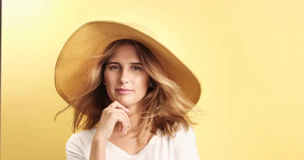 Smiling blonde woman wearing hat — Stock Photo, Image