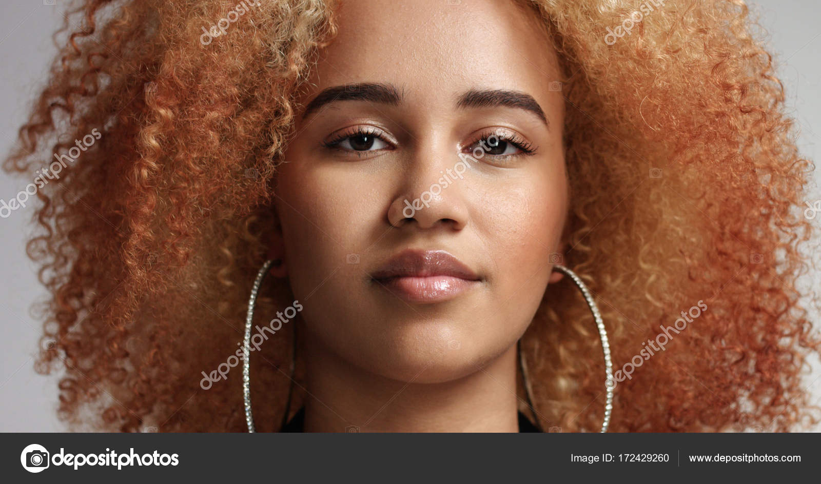 black female with light afro hair Stock Photo by ©kazzakova