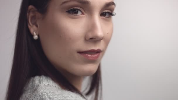 Closeup of spanish woman looking at camera — Stock Video