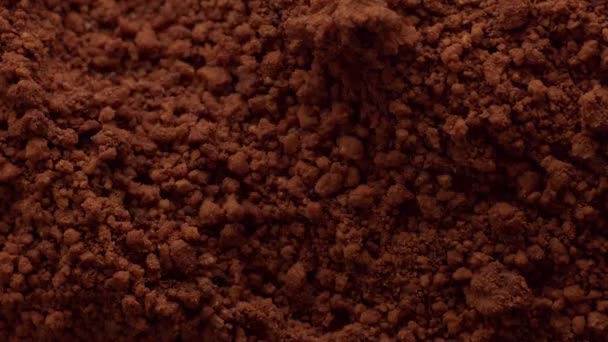 Bruin powdercakce chocolade texture bewegende bovenaanzicht — Stockvideo