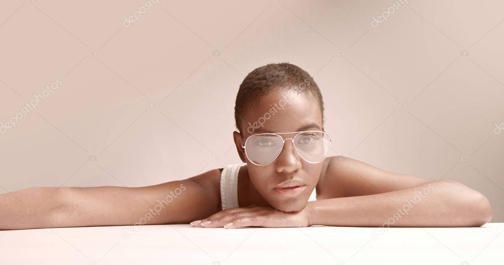 black woman with a short haircut in studio shoot