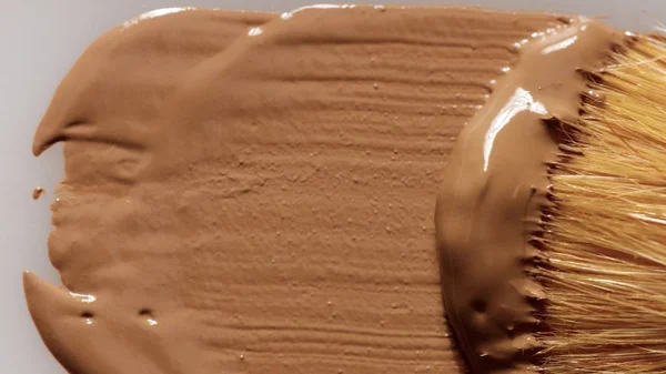 Vloeibare foundation textuur smudge met borstel — Stockfoto