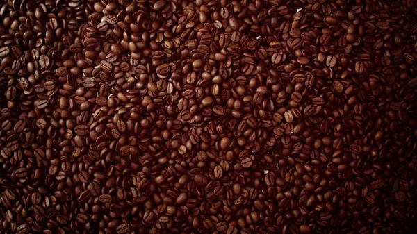 Pohled shora zrn coffe pozadí plné cofe fazole — Stock fotografie