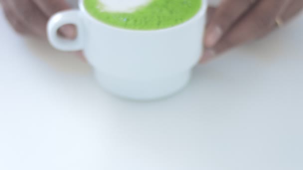 Matcha tea preparation in cafe by mixed race barman — Stock Video