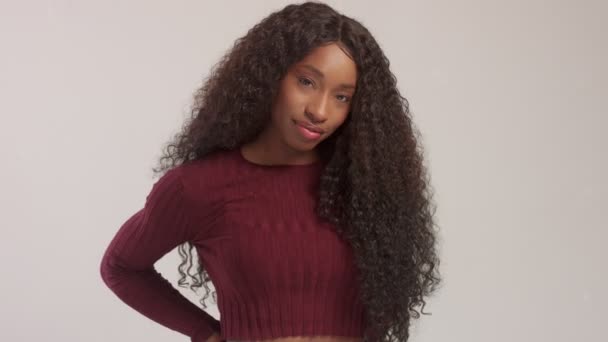 Beauty black mixed race african american woman with long curly hair and perfect smile — Stock Video