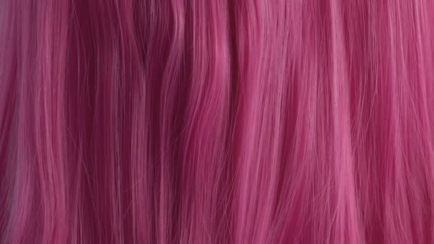 Roze creatieve kleur haar textuur closeup — Stockvideo