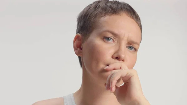 Woman in studio making faces — Stock Photo, Image