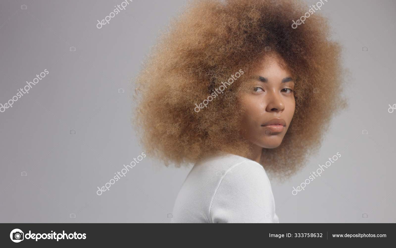 Mixed race black woman with big afro hair in studio put a cream smudge Stock Photo by ©kazzakova 333758632 Mixed race black woman with big afro hair in studio put a cream smudge Stock Photo by ©kazzakova 333758632