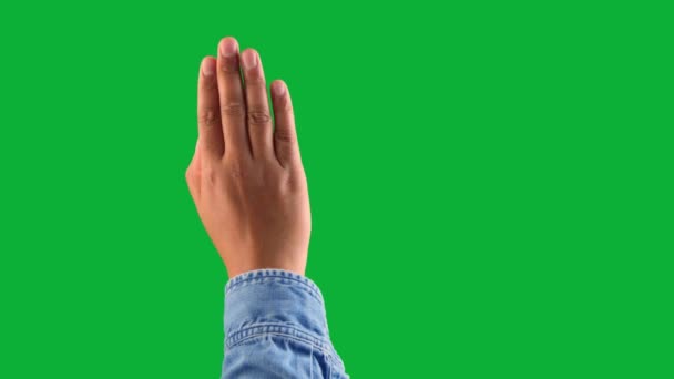 Mixed race deep skin tone male hand makes a swipe up gesture on chromakey green — Stock video