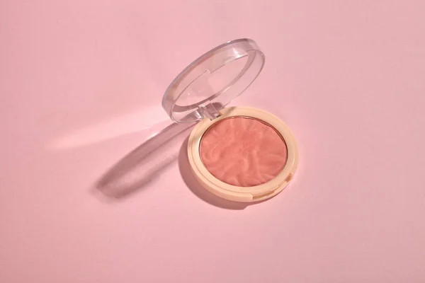 A compact blusher on pink background — Stock Photo, Image