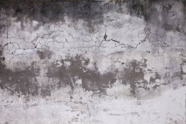 Eski beton duvar çatlaklar. Yaşlı kırık alçı duvar arka plan ve doku tarzı. Çimento üzerinde tasarım