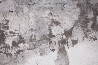 Eski beton duvar çatlaklar. Yaşlı kırık alçı duvar arka plan ve doku tarzı. Çimento üzerinde tasarım