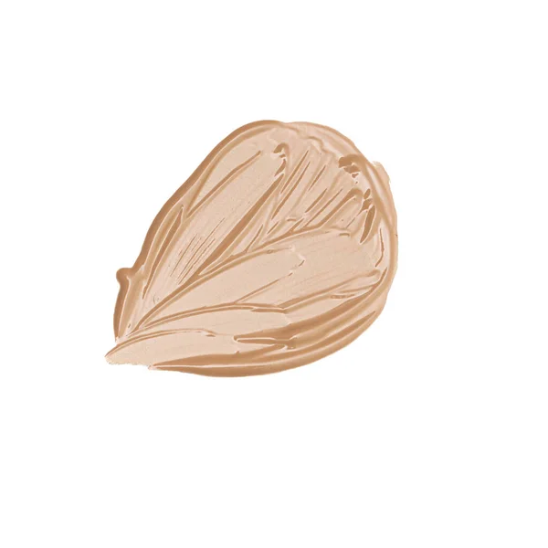 stock image Close-up of a smear of concealer or foundation on a white background.