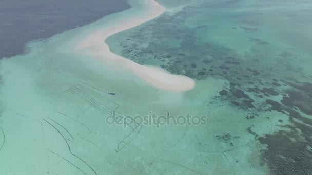 Drone shot revealing sand bank running into the sea at Ngur Tafur, Indonesia — Stock Video