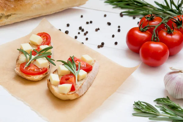 Bruschetta Toasts Mozzarella Cherry Tomatoes Garlic Fresh Garden Rosemary Close — Stock Photo, Image