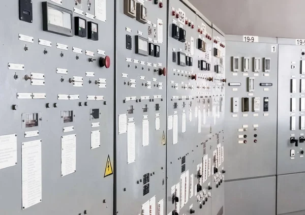 Industry. Regulation and control elements on the control cabinet. Close-up.