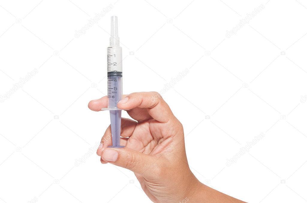 Nurse prepares a syringe for patients to help treat the disease 