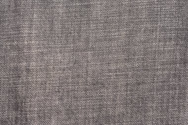 denim kot pantolon yıpranmış delik, siyah kumaş gr ile arka plan doku